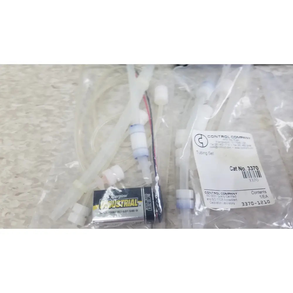 Clear plastic tubing set with white connectors and energizer industrial label for verities analyzer clinical laboratory diagnostic system