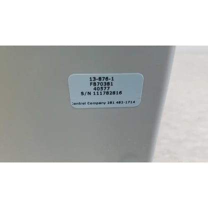 Gray industrial control unit with white label showing serial number for verities analyzer clinical laboratory diagnostic system