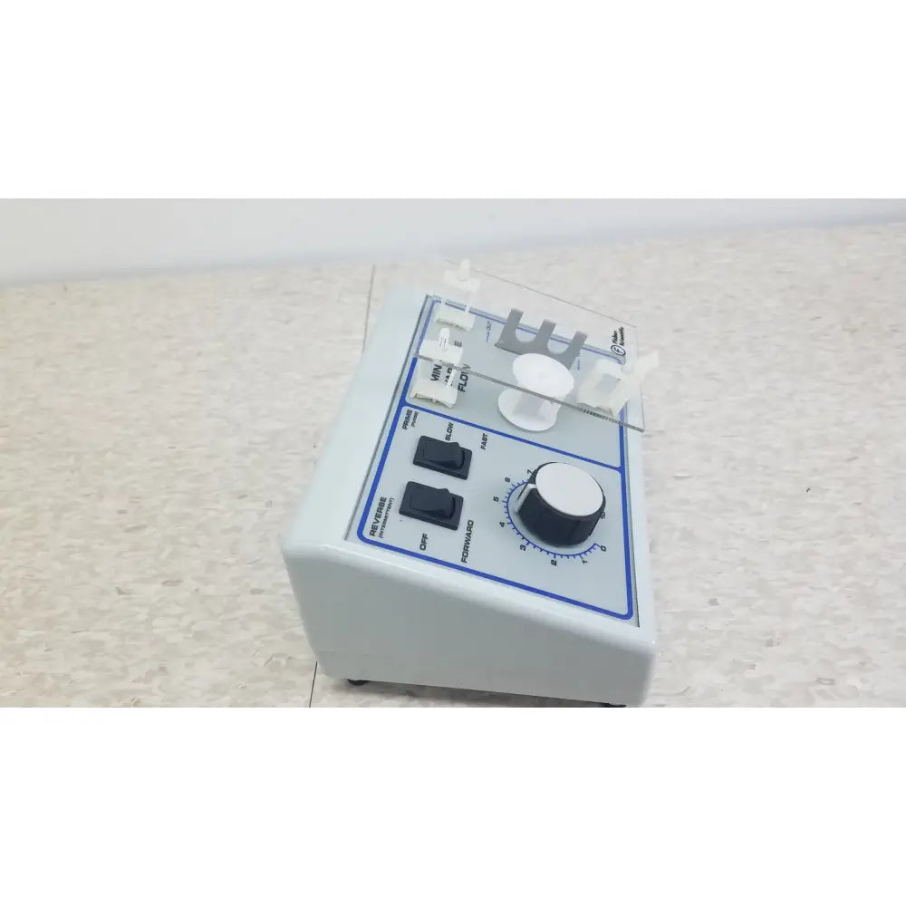 White plastic verities analyzer with blue control panel and black rotary dial for clinical laboratory diagnostic use