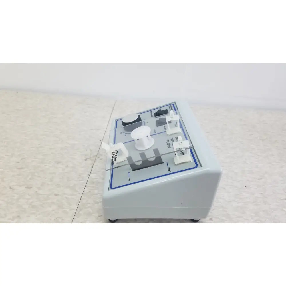 Light gray verities analyzer clinical laboratory diagnostic system with white knobs and transparent glass panel slot