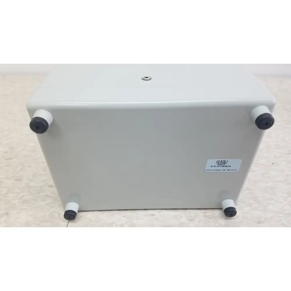Gray rectangular verities analyzer with black and white rubber feet for clinical laboratory diagnostic use