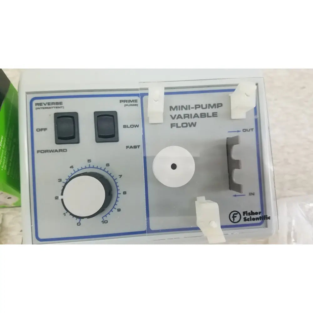 White plastic mini-pump variable flow device with blue labeling and control knobs for verities analyzer clinical laboratory diagnostic system