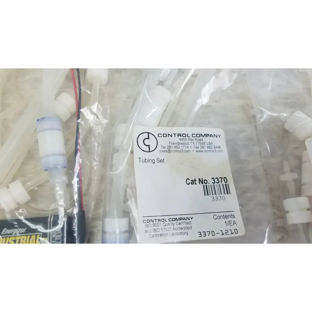 Clear plastic tubing set with white connectors and red wire for verities analyzer clinical laboratory diagnostic system packaging