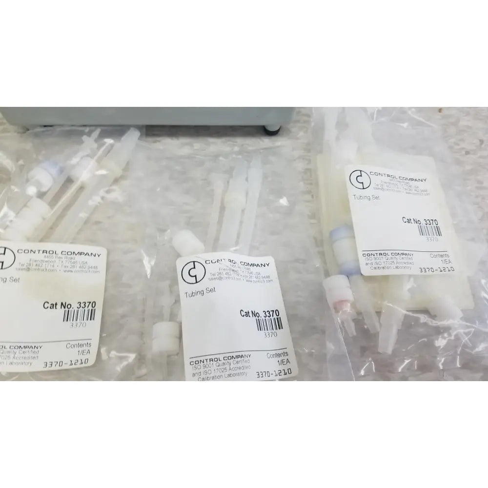Clear plastic tubing sets in transparent packaging labeled control company for verities analyzer clinical laboratory diagnostic use