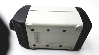 Vision engineering 0022934 microscope camera head in black and white with rounded edges and four circular feet shown from bottom side