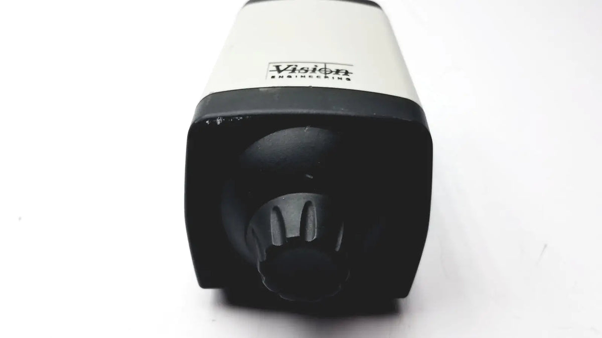 Black and white matte microscope camera head by Vision Engineering featuring cylindrical design and logo on upper section
