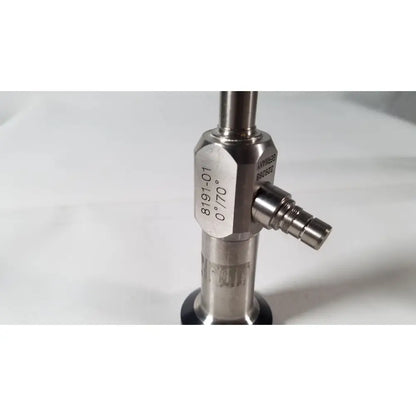 Stainless steel vista stereo laparoscopic surgery endoscope with engraved model number and side port showing dents