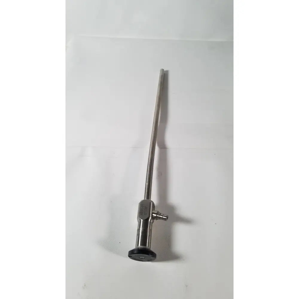 Silver vista stereo laparoscopic surgery instrument with long metallic shaft black-tipped base showing dents reuse medical
