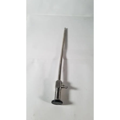 Silver vista stereo laparoscopic surgery instrument with long metallic shaft black-tipped base showing dents reuse medical