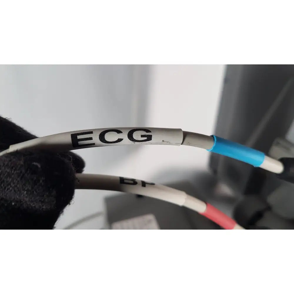 Gray ecg cable with black lettering and blue connector shown in volcano s5 imaging operator’s manual for reuse medical use