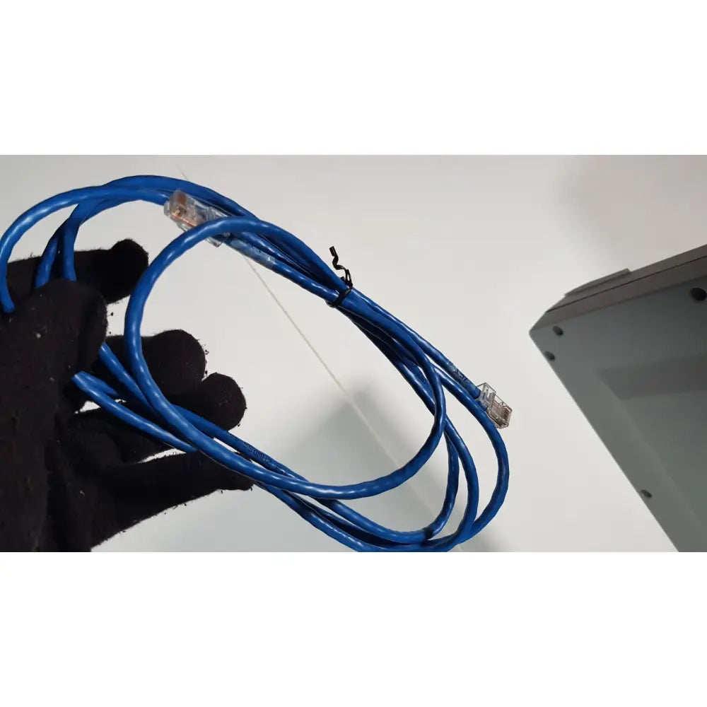 Blue ethernet cable with clear connectors secured by black tie in volcano s5 imaging system operator’s manual for reuse medical