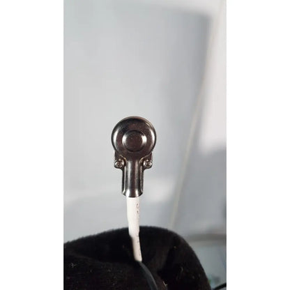 Black metallic camera lens mount with white cable on the back side of volcano s5 imaging operator’s manual for reuse medical