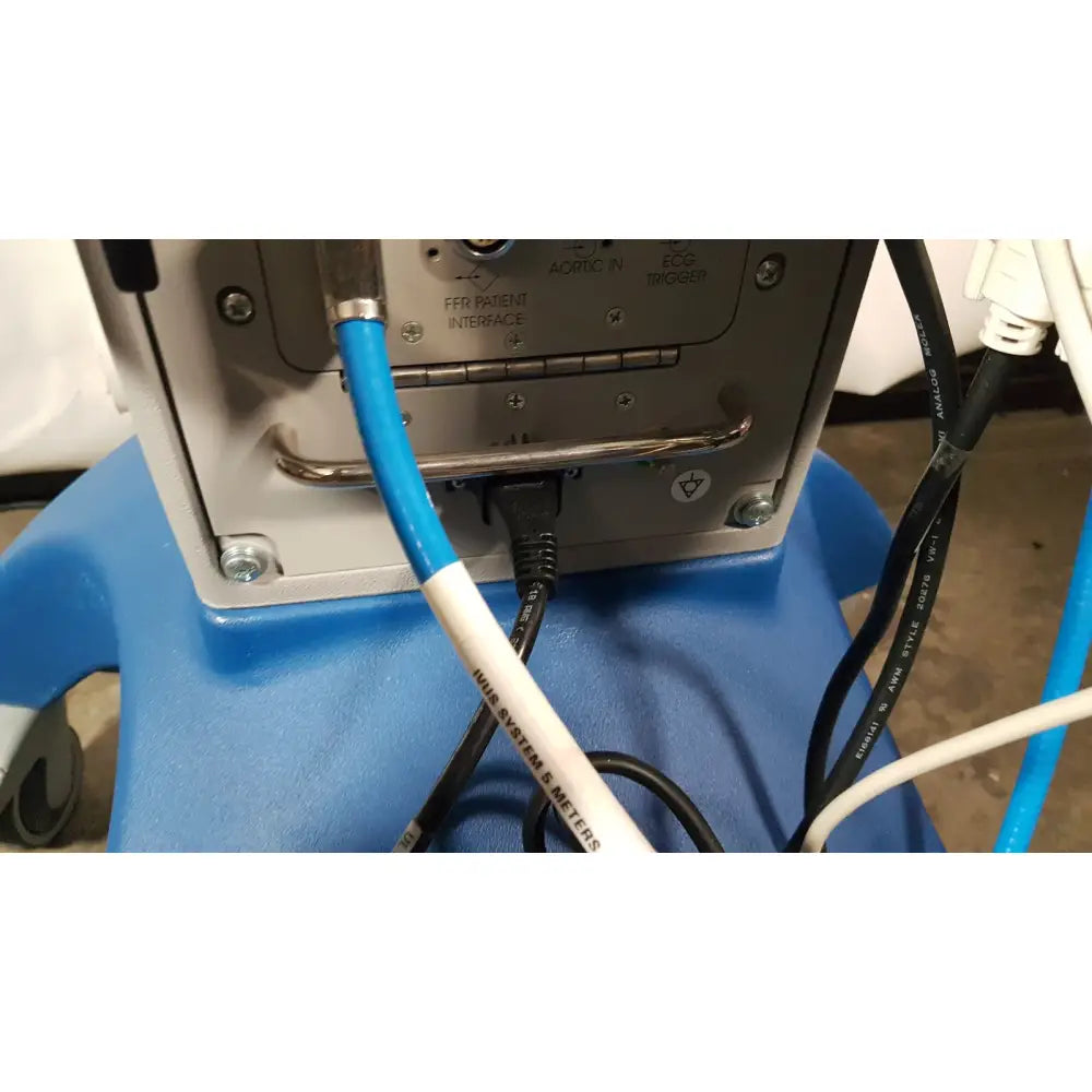 Blue and white reuse medical cable connected to gray volcano s5 imaging system in operator’s manual back view