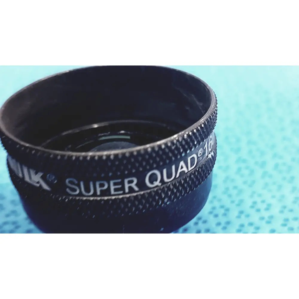 Black Nikon volk super quad 16mm ophthalmic laser lens attachment with textured grip and white lettering