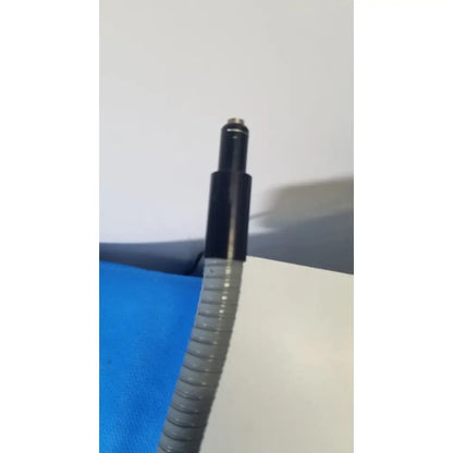 Gray corrugated cable with black cylindrical connector for Volpi Intralux 5000 fiber optic illuminator dual gooseneck microscope light