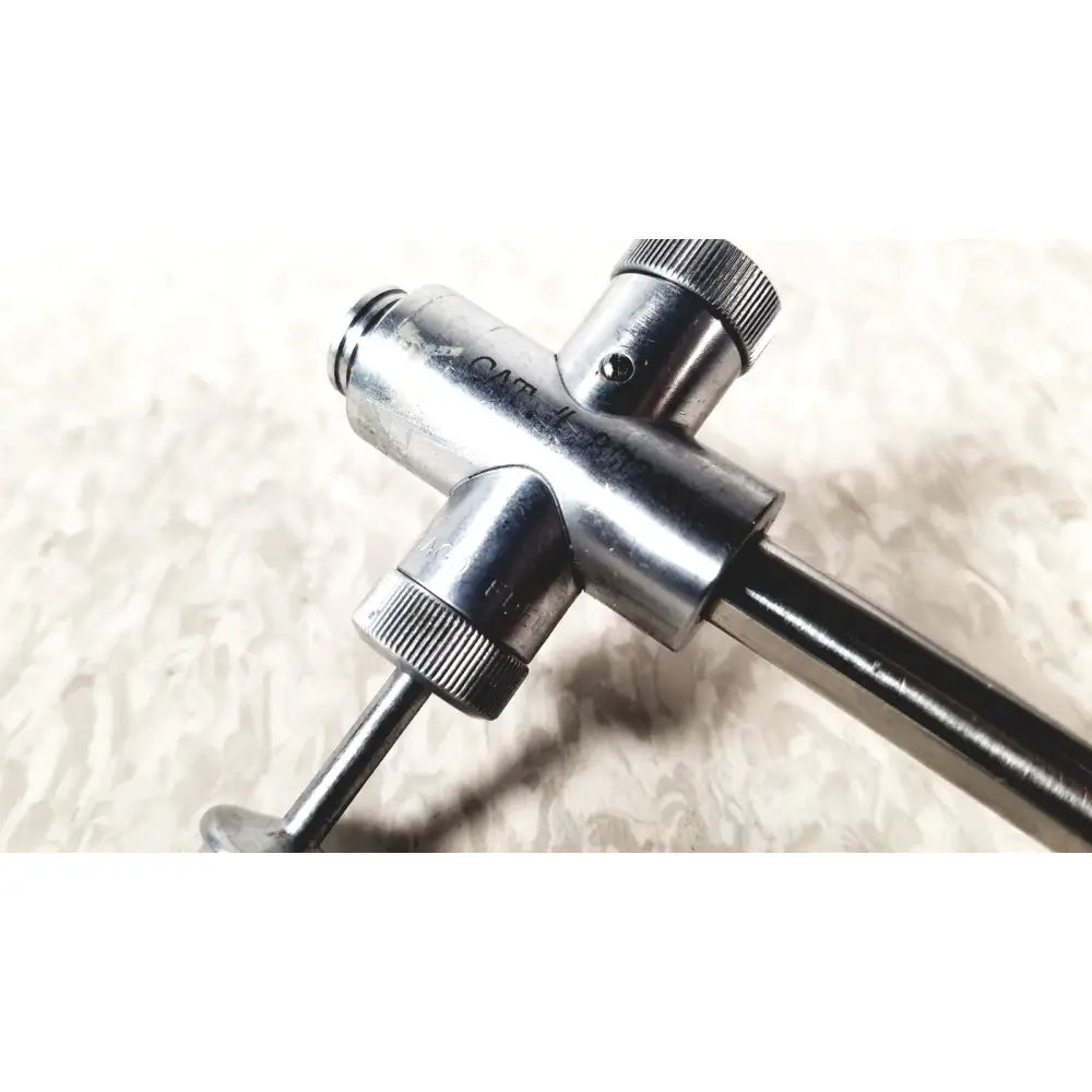 Silver metallic vwgh cat three-way valve with knurled knobs and threaded ports for reuse medical endoscope sheath