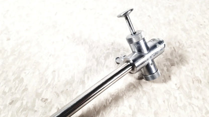 Silver-colored metal vwgh cat endoscope sheath with long slender shaft and threaded knobs for precise control reuse medical use