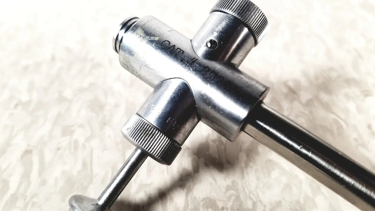 Silver metallic vwgh cat three-way valve with knurled knobs and threaded ports for reuse medical endoscope sheath