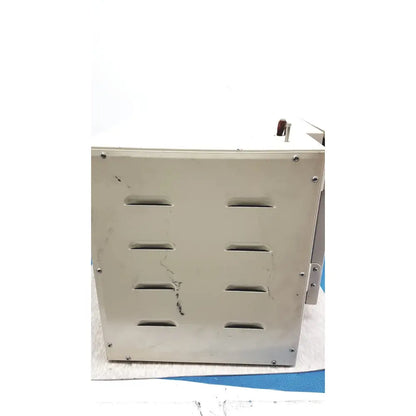 Beige metal scientific vacuum oven with horizontal ventilation slots and screws for electromotors laboratory use