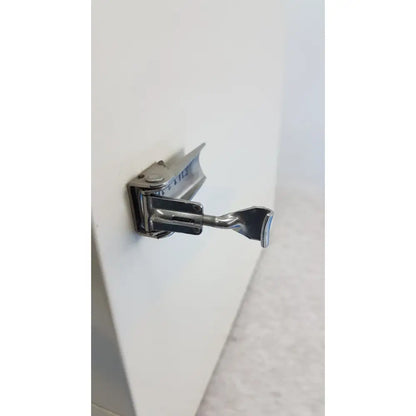 Silver metal door hinge with lever mechanism on vwr 1410 scientific vacuum oven for laboratory use
