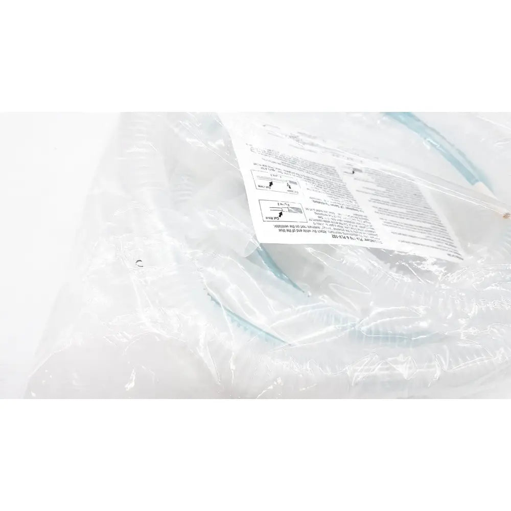 Light blue plastic nasal cannula in clear packaging with manual for vyaire airlife volume ventilator circuit