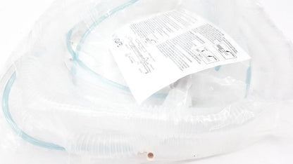 Clear plastic oxygen mask with coiled tubing in transparent packaging for vyaire airlife volume ventilator circuit