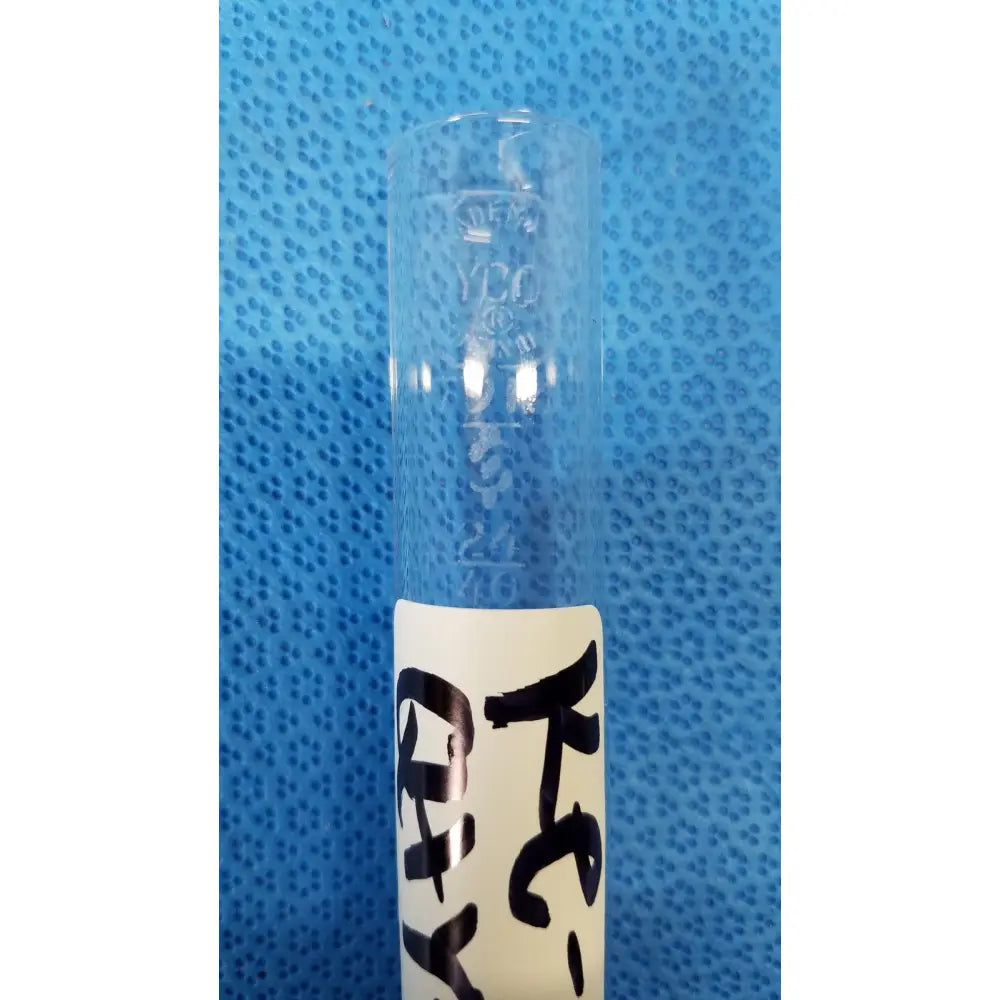 Clear glass borosilicate test tube with embossed markings and white label in vycor 24/40 ground joint corning adapter