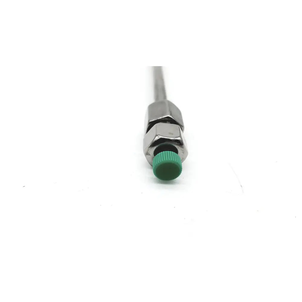 Metallic medical syringe with green plastic cap shown with vydac e970702-4-3 peptide c18 column part number 218tp54