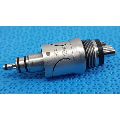 Silver metallic w&h handpiece coupler with black rubber seals and engraved markings for dental connector use