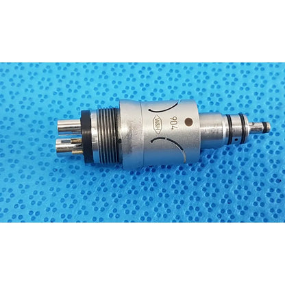 Silver metallic w&h handpiece coupler with engraved 706 marking and black rubber seals dental connector for high-speed use