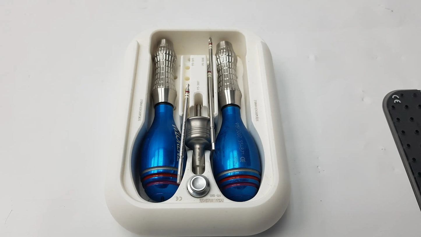 Blue dental handpiece set with silver textured handles and red rings for lorenz surgical endobrow lift kit fixation system