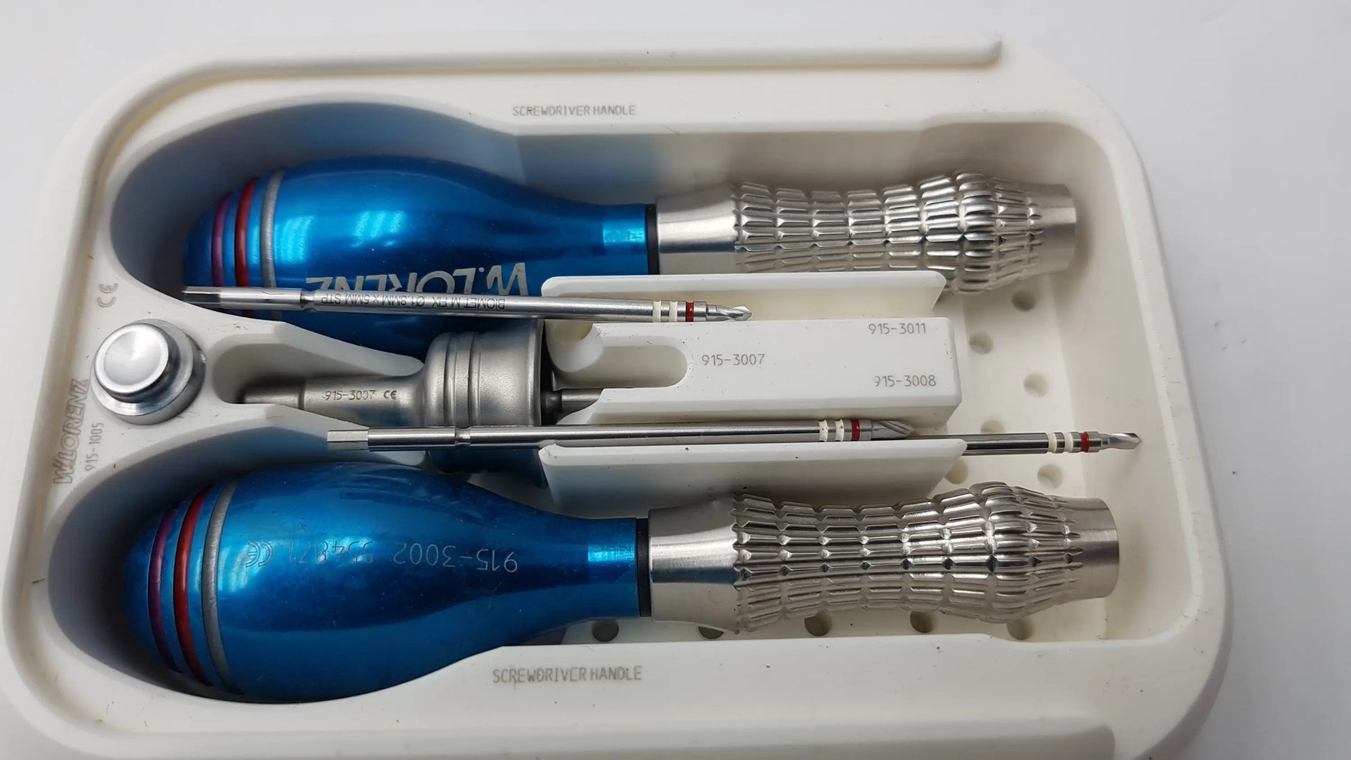 Blue and silver lorenz surgical endobrow lift kit screwdriver set with textured grips for precise fixation use
