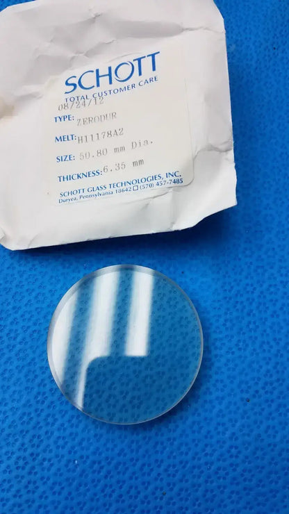 Schott W1147 Schott Zerodur Exp. Class 2 127x90mm Ellipse 10mm + Melt H11178A2 6.35mm Optical Glass Substrate, as-is (for parts) product photo 1