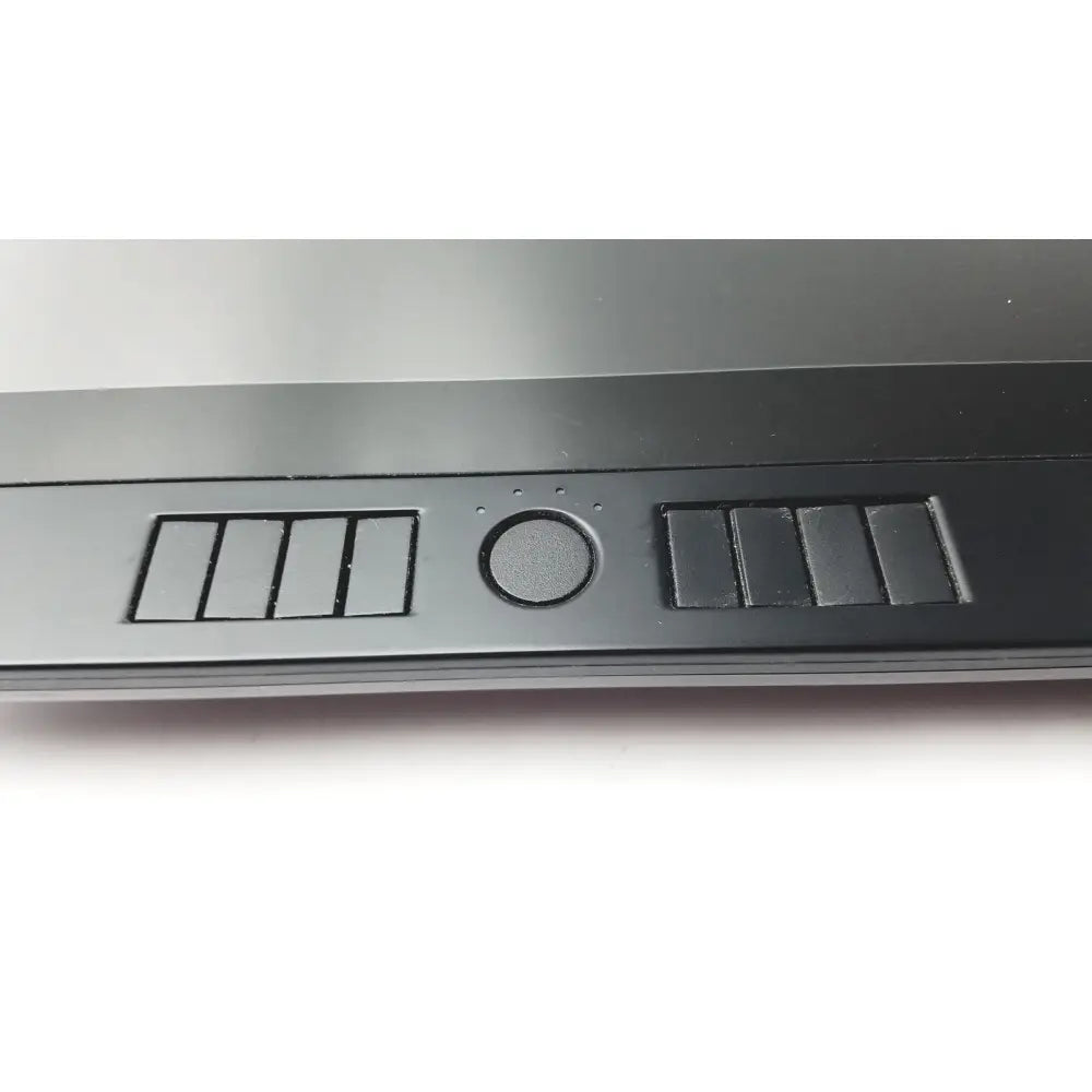 Black laptop bezel with integrated touchpad and speaker grilles on the wacom cintiq 21ux graphics monitor