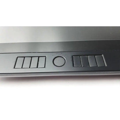 Black laptop bezel with integrated touchpad and speaker grilles on the wacom cintiq 21ux graphics monitor