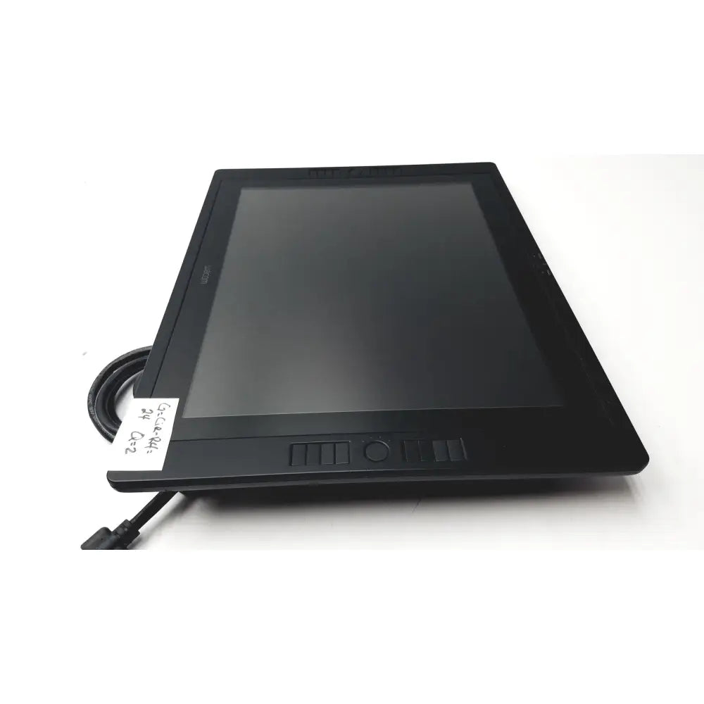 Black rectangular wacom cintiq 21ux graphics monitor with a matte touchscreen and integrated control buttons below