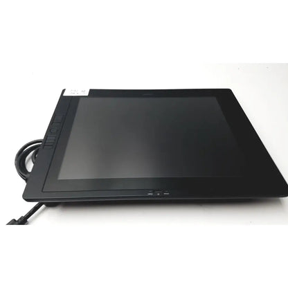 Black rectangular wacom cintiq 21ux graphics monitor with glossy screen matte bezel and physical buttons on left side