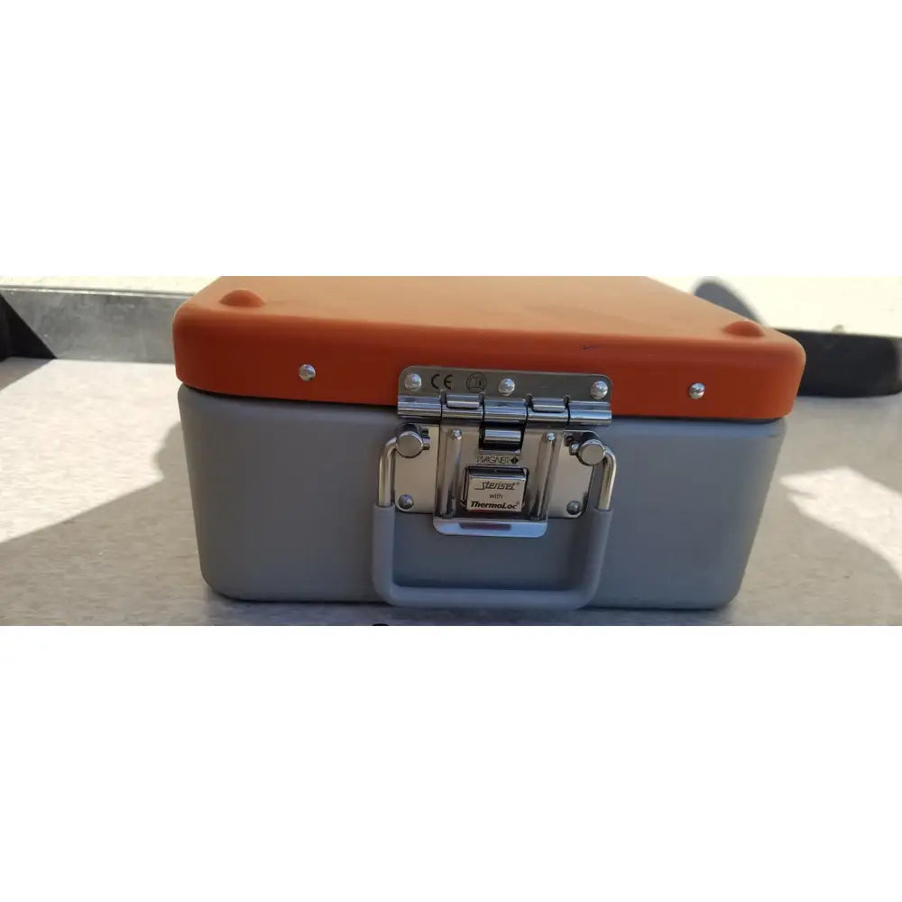 Gray and orange Wagner Steriset storage hard-shell toolbox with silver metal latch and handle branded thermal-ed