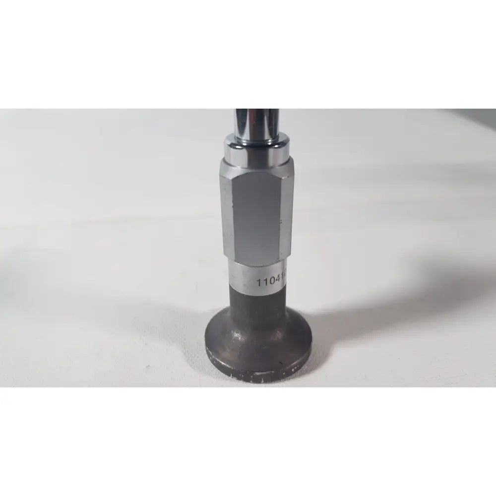 Metallic valve stem with hexagonal midsection and flat darkened base for Weck 110410 laparoscope 0 degree scope reuse medical use