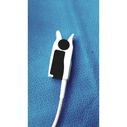 White plastic pulse oximeter clip with black sensor pad and cable for welch allyn 300 series vital signs monitor