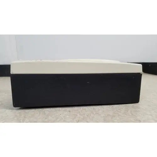 Black and cream two-tone rectangular box with raised rounded lid for welch allyn 48740 exam light reuse medical use