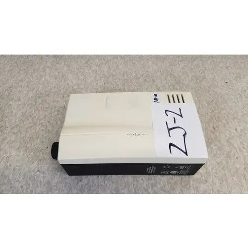 White and black rectangular welch allyn exam light with 25-2 label designed for medical examination use