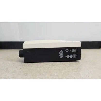 Black and white welch allyn 48740 exam light with cylindrical protrusion designed for medical examination lights use