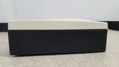 Black and cream two-tone rectangular box with raised rounded lid for welch allyn 48740 exam light reuse medical use