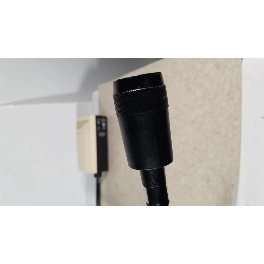 Black cylindrical connector with textured grip and threaded end for welch allyn 48740 exam light neck