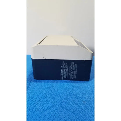Welch allyn 48830 lite box rectangular reuse medical device with white top and dark blue base for medical use