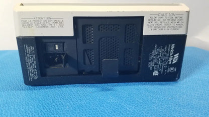 Back side of a welch allyn 48830 lite box black and white reuse medical device with vented panel labeled wectron