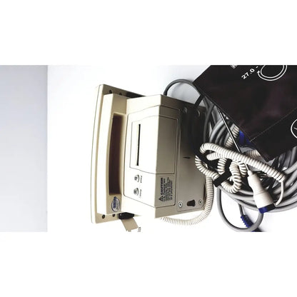 Beige welch allyn 52000 series vital signs monitor with coiled cables and black blood pressure cuff for vital signs measurement