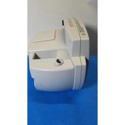 White plastic welch allyn 530t0 vital signs monitor with rectangular shape and circular port on the front panel