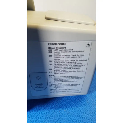 Beige welch allyn 530t0 vital signs monitor displaying error codes for blood pressure spo2 and temperature readings